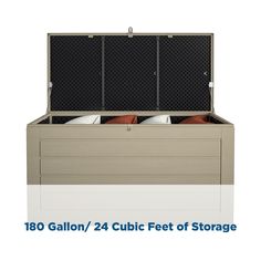 an open storage box filled with pillows on top of a white floor next to the words, 1800 gallon / 24 cubic feet of storage