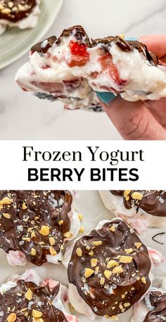 a person holding up a chocolate covered strawberry yogurt bites in front of other desserts