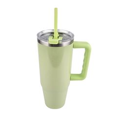 a green cup with a straw in it