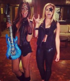 two women dressed up as rock band members