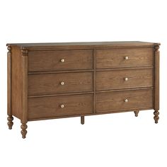 a large wooden dresser with six drawers