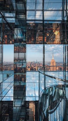 an image of the city taken from inside a glass building in new york, usa