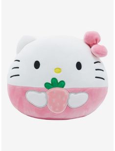 a hello kitty stuffed animal with a strawberry on it's face and ears,