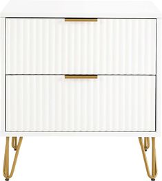 a white and gold dresser with two drawers