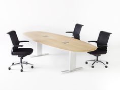 an office table with two chairs next to it