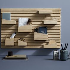 a wooden shelf that has various items on it