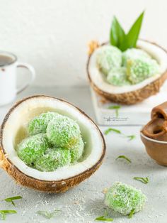 coconuts with green powdered sugar in them