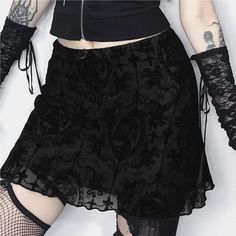 This Gothic Pattern Mesh Overlay Mini Skirt exudes alternative aesthetics with a touch of sophistication. The intricate Gothic pattern mesh overlay adds texture and depth, while the lettuce hem and above-the-knee length create a flattering silhouette. Crafted from a luxurious blend of polyester and spandex, this skirt offers both comfort and style, making it a must-have for those who embrace a bold and edgy look. Skirt Types, Box Skirt, Carnival Masquerade, Mini Skirt Party, Gothic Pattern, Evening Skirts, Fall Pants, Dark Style, Holiday Halloween