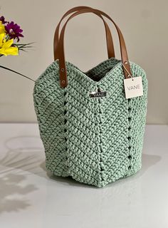 VANE Handmade Handbag Camila Crochet bag made of polyester yarn in the color bright olive - Elegant leather handles for a modern touch - Elastic model - Dust bag, perfect for safe storage Dimensions: 25 x 32 cm Modern Rectangular Crochet Bag For Daily Use, Green Bags With Braided Handles For On-the-go, Modern Crochet Tote Bag With Leather Handles, Modern Crochet Bag With Leather Handles For Shopping, Modern Crochet Tote Bag For Shopping, Modern Crochet Bag With Leather Handles, Modern Crochet Tote Bag For Everyday Use, Modern Crochet Bag With Double Handle For Everyday Use, Modern Crochet Shoulder Bag For Everyday Use