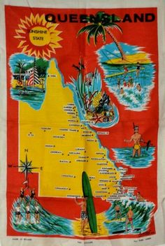 a towel with a map of the state of queensland on it and people swimming in the ocean