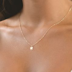 Discover our charming Tooth Necklace, a delightful homage to dental professionals and a symbol of oral health and wellness. Carefully crafted with attention to detail, this necklace is available in your choice of premium gold filled, sterling silver, or rose gold filled materials, ensuring both style and durability. 🦷  ✨ High-Quality Materials: Choose from luxurious gold filled, sterling silver, or rose gold filled options, meticulously crafted to maintain their shine and luster for years to co Tooth Necklace Diy, Tooth Necklace Aesthetic, Gold Tooth Necklace, Dragon Tooth Necklace, Dentist Graduation, Gold Tooth, Dental Jewelry, Tooth Jewelry, Dental Assistant Gifts