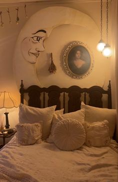 a bed with white sheets and pillows in front of a painting on the wall above it