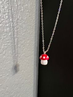 handmade silver necklace with red and white mushroom charm! :) this necklace measures around 16.5in in length and has lobster claw clasp! thank you for checking out my shop! <3 Red And White Mushroom, White Mushroom, White Mushrooms, Handmade Beaded Necklaces, Lobster Claw, Handmade Silver, Charm Necklace, Necklace Etsy, Red And White