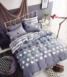 a bed with blue and white stars on it