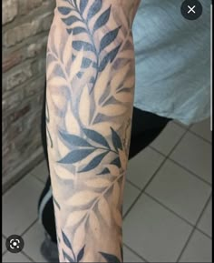 a person with a tattoo on their arm