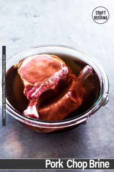 two pieces of meat in a metal bowl