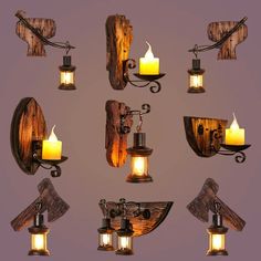 a collection of rustic wall sconces with candles