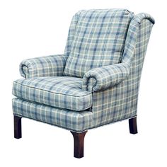 a blue and white plaid chair with wooden legs