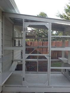 the inside of a house that has a large metal cage on it's side