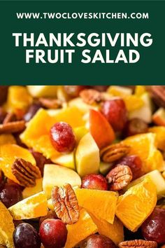 thanksgiving fruit salad with pecans, oranges, apples and cranberries in it