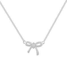 Add a bit of twinkle and sparkle to your style with the Dolly Necklace. This shiny, statement necklace features a pavé bow pendant that'll bring major eye-catching glamour to any outfit. Whether you dress it up or down, you'll love the way the Dolly looks! (Plus, who doesn't love a bow?!) Elegant Sterling Silver Necklace With Bow, Diamond Bow Necklace, Necklaces Pearl Bow, Elegant Bow Pendant Necklace, Diamond Angel Wing Necklace, Bow Pendant, Descendants, Cz Stone, Twinkle Twinkle