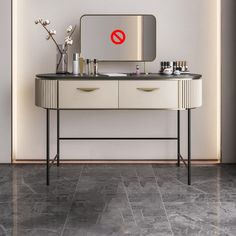 a vanity with a mirror and various items on it in front of a wall that has a no entry sign