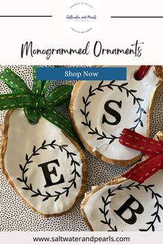 three decorated christmas ornaments on top of a table with the words shop now written on them