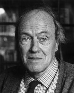 black and white photograph of an older man in a suit looking at the camera with serious expression on his face