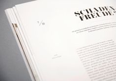 an open book with black and white text on the page, titled schadder freude?