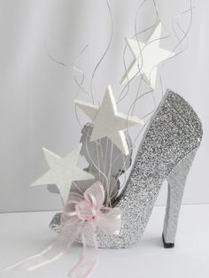 silver glitter high heel shoe with stars on it