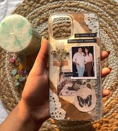 a person holding up a cell phone case with an image on it and a soap bar next to it