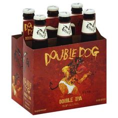 six bottles of double dog beer in a cardboard box