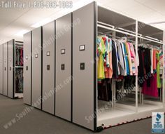 a room filled with lots of different colored shirts hanging on the walls and closets