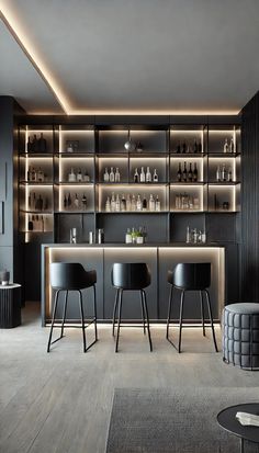 a modern bar with black chairs and shelves