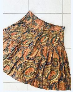 Excellent vintage condition! 100% rayon  Label: GAP (1990's-00's) Measures 30" inch waist, 22" inch length Vintage Fitted Mini Skirt With Tiered Design, Vintage Fitted Tiered Mini Skirt, Fitted Long Skirt With Paisley Print, Fitted Silk Bohemian Bottoms, Vintage Fitted Mini Pleated Skirt, Fitted Vintage Mini Pleated Skirt, Vintage Silk Long Skirt, Vintage Lined Flared Mini Skirt, Vintage Mini Skirt With Flowy Design