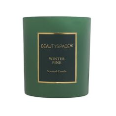 a candle that is green and has gold trimmings on the front, with a black