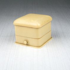 a small wooden box sitting on top of a table