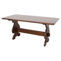 a wooden table sitting on top of a white background