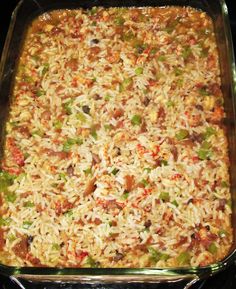 a casserole dish filled with rice and vegetables