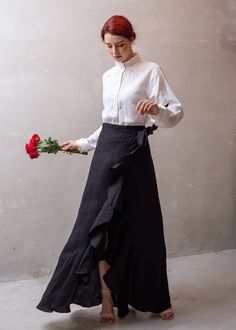 "Linen Wrap Skirt RUFFLE, Black Linen Skirt in 20+ colors, Boho Linen Skirt, Plus size, Summer Linen skirt, Handmade Clothing - Skirt only - Wrap closure - Skirt length is 100cm (39.5 inches) -  Floor length for our model who is 174cm (5'9'') tall - Ruffle at the bottom, it will move nicely when you walk - Made from High quality linen, 100% pure linen, and only get better with time - Handmade at our studio - Made to order.  - Made to measurement is an option! Please message us if you would like to discuss more. Please read carefully to choose the right size: * XS (UK 6, USA 2) Best for busts up to 32'' (81 cm). Best for waists up to 26\" (66 cm). * S (UK 8, USA 4) Best for busts: 32-33'' (81-84 cm). Best for waists 26-27\" (66-69 cm). * S/M (UK 10, USA 6, EURO 38) Best for busts: 33-34.5'' Black Linen Skirt, Linen Wrap Skirt, Skirt Ruffle, Skirt Plus Size, Handmade Clothing, Summer Linen, Plus Size Summer, Linen Skirt, Black Linen