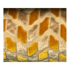 an image of a yellow and brown pattern on the side of a wallpapered surface