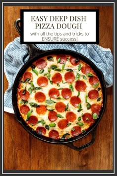 a pizza sitting in a pan on top of a wooden table