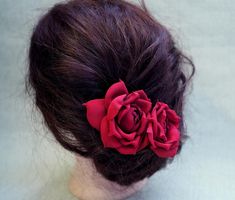 Handcrafted from rich burgundy fabric petals, the red flower hair clip has been lovingly hand formed in romantic red tones, petal by petal, to create a whimsical and glamorous headpiece. Designed to be worn to the side of the head or at the top of a  updo, this red rose hair piece will captivate and delight with its unique colour and feminine details. Pair it with a veil in ivory tones, the satin rose hair clip could be the ultimate red satin rose for modern romantics. Versatile as it is, the rose for hair could be placed in the hair or pinned on a sash, dress, jacket, scarf,clutch etc. Specify from the drop the drop down the size, finish and quantity you want. The bigger red rose bridal hair piece measures 4.72" or 12 cm in diameter. The spanish rose hair piece measures around 3 " or 7 cm Rose Hair Piece, Fabric Petals, Baby Flower Headbands, Die Rose, Rose Hair Clip, Burgundy Fabric, Fabric Rose, Rose Brooch, Bridal Hair Piece