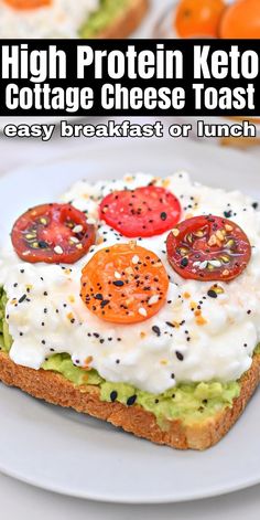 an egg, tomato and avocado sandwich with cream cheese on toasted bread