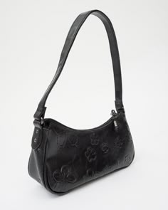 Vintage black vegan leather baguette bag embossed with butterflies and flowers. So darling.•Black vegan leather•Embossed with butterflies and flowers•Fully lined•Zipper closure•Zipped pocket insideLABEL: n/aCONDITION: Vintage / ExcellentSIZE: Small Coach Black Hobo Bag Vintage, Vintage Purse Aesthetic, Black Purse Aesthetic, Black Small Handbag, Black Prada Bag, Leather Baguette Bag, Purse Aesthetic, Pretty Fits, Small Black Purse