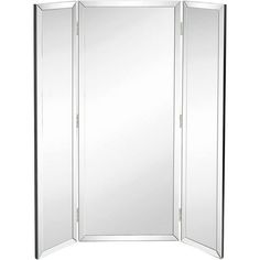 a white room divider with mirrors on the sides and one door open to reveal a mirror