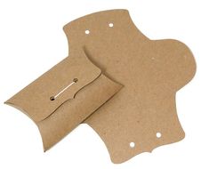 two pieces of brown paper with holes on them