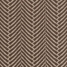 a brown and white chevroned pattern on fabric