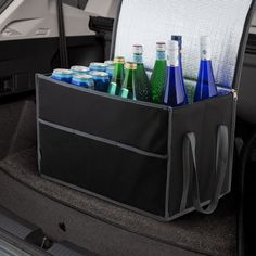 the back end of a car with bottles in it