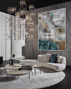 a living room filled with furniture and lots of lights hanging from it's ceiling